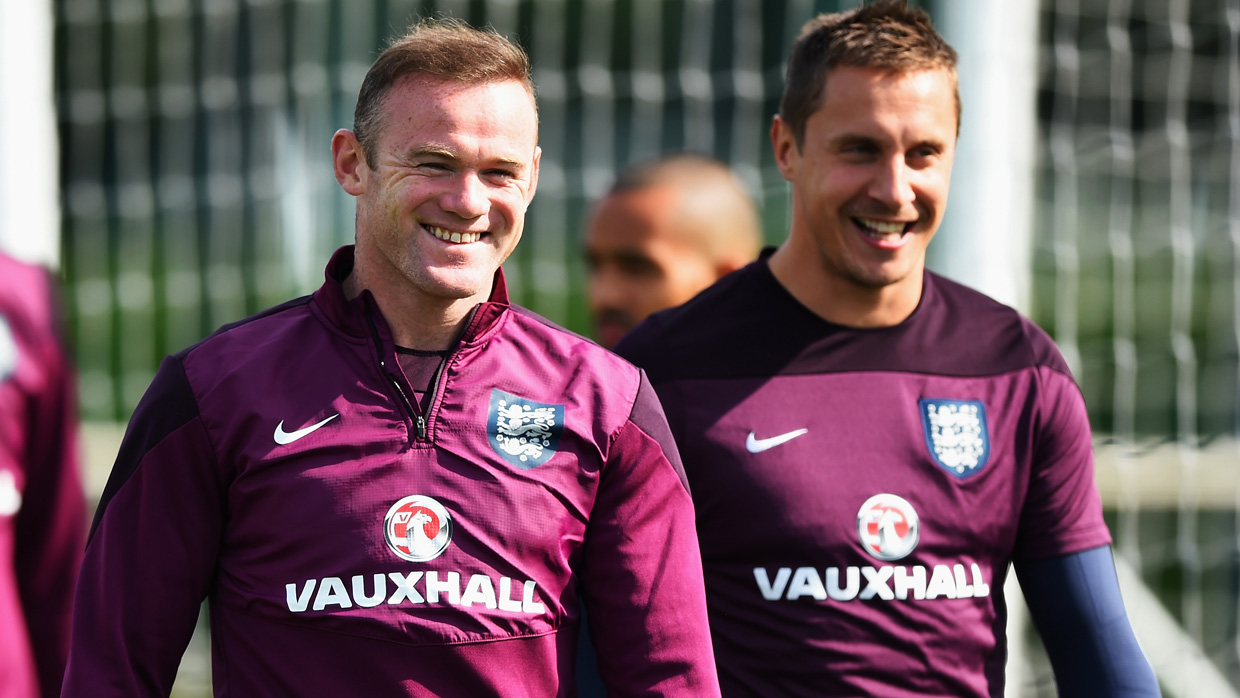 Wayne Rooney says he will never retire from England duty